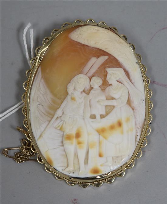 A 9ct gold mounted cameo brooch carved with a Dutch? scene, 63mm.